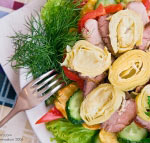 Meat salad with an artichoke